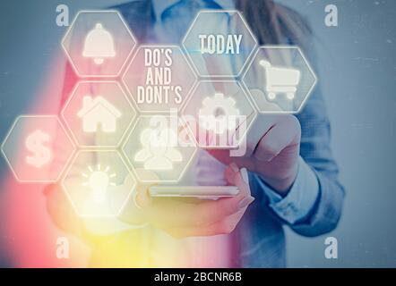 Conceptual hand writing showing Do Is And Dont Is. Concept meaning advising Rules or customs concerning some activity Stock Photo