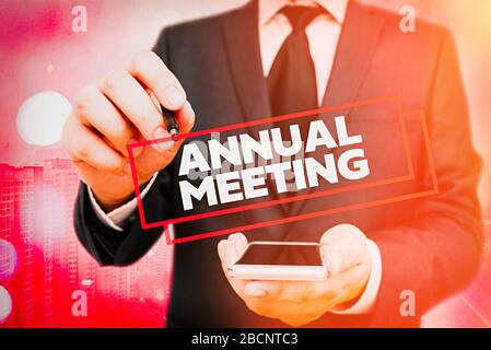 Handwriting text Annual Meeting. Conceptual photo yearly meeting of the general membership of an organization Stock Photo