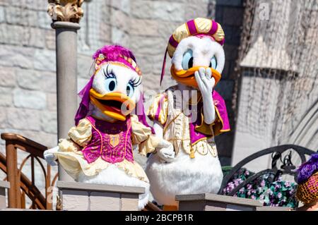 Live Disney show in front of the Castle in the Magic Kingdom theme park at Disney World, featuring Minnie and Mickey Mouse, Elsa, Anna and Olaf etc Stock Photo