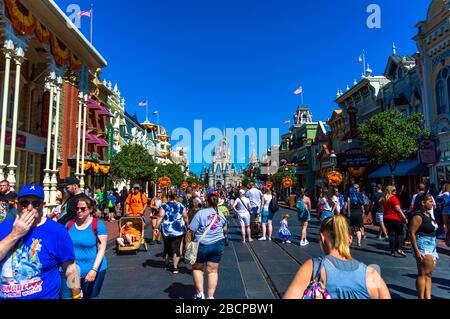 View down Main Street at Disney World with the Castle in the background, Magic Kingdom, Disney World Resort, Orlando, Florida Stock Photo