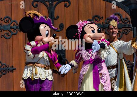 Live Disney show in front of the Castle in the Magic Kingdom theme park at Disney World, featuring Minnie and Mickey Mouse, Elsa, Anna and Olaf etc Stock Photo