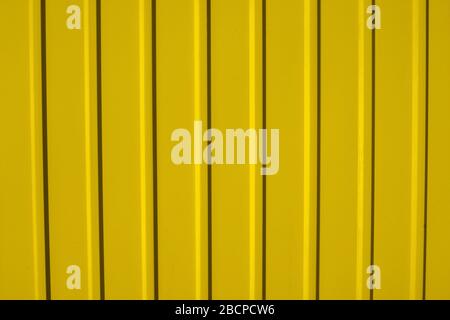 Texture of metal fence picket Profile decking. metal picket fence. Profiled metal. Stock Photo
