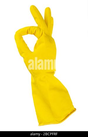 Yellow rubber gloves for cleaning, workhouse concept. Ok symbol. File contains clipping path. Stock Photo
