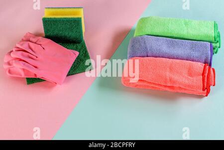 Minimum cleaning set for different surfaces in house closeup, top view. Cleaning product, keeping house clean. Stock Photo