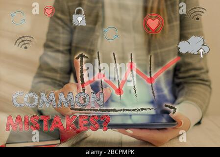 Handwriting text writing Common Mistakes question. Conceptual photo repeat act or judgement misguided or wrong Stock Photo