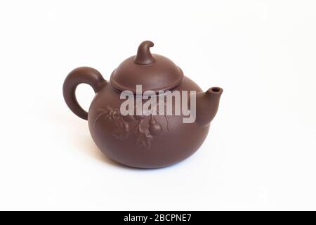 traditional Chinese teapot made of Issinclay clay, tea ceremonion, isolated on a white background, design Stock Photo
