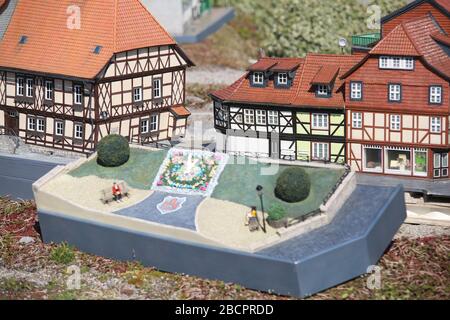 25 March 2020, Saxony-Anhalt, Wernigerode: Models of half-timbered houses and the flower clock in Wernigerode were built in the Miniaturenpark Wernigerode. More than 60 models of famous Harz sights on a scale of 1:25 are shown in the Miniaturenpark. Due to the Corona crisis the opening of the season will be postponed for an uncertain time. Photo: Matthias Bein/dpa-Zentralbild/ZB Stock Photo