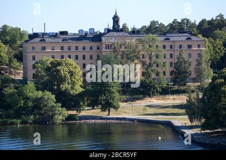 STOCKHOLM, SWEDEN-CIRCA JUN, 2018: Facade of Campus Manilla is on shore of archipelago. It is a primary and secondary school for deaf and hearing impa Stock Photo