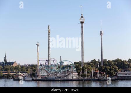 STOCKHOLM, SWEDEN-CIRCA JUN, 2018: Grona Lund amusement park with roller coasters and thrill rides. It is located on the seaward side of Djurgarden Is Stock Photo