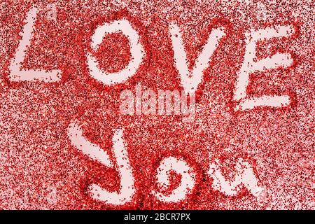 love concept background with love you words written on red glitter, valentines day background Stock Photo