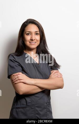 Portrait of a health professional, dentist, doctor, nurse, assistant, isolated from a white background. Stock Photo