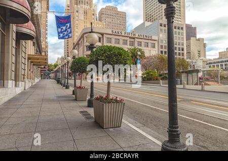Powell Street by the Union Square is empty of tourists and traffic during the city lockdown due to COVID-19 pandemic 2020, San Francisco, CA, USA.