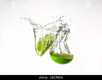 lime falling water with, a beautiful splash, green and white slow motion and very fast shoot Stock Photo