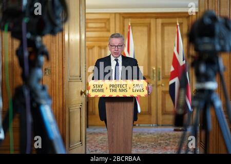 (200405) -- LONDON, April 5, 2020 (Xinhua) -- Britain's Minister for the Cabinet Office Michael Gove speaks at a digital COVID-19 press conference in 10 Downing Street in London, Britain, April 4, 2020. At the government's daily coronavirus press briefing, Gove said hundreds of new ventilators are being manufactured daily in Britain and 300 arrived from China on Saturday. (Pippa Fowles/No 10 Downing Street/Handout via Xinhua) (EDITORIAL USE ONLY)