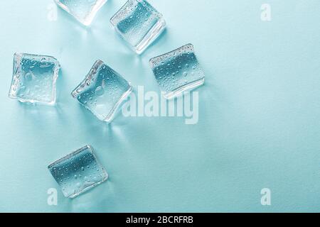 Colored banner with fresh ice cubes and reflections Stock Photo