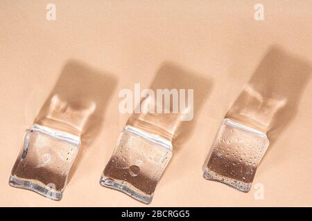 Colored banner with fresh ice cubes and reflections Stock Photo