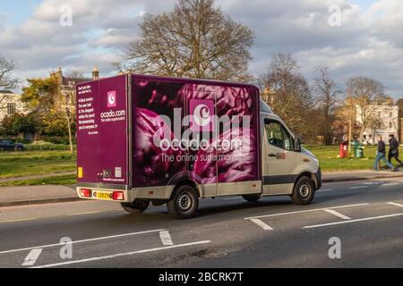 LONDON, UK - 3RD APRIL 2020: An Ocado delivery truck on a road in London during the day. Ocado is an online supermarket where people can buy groceries Stock Photo