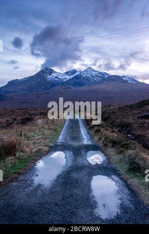 A bumpy road to the Cuillin hills on the Isle of Skye, Scotland UK Stock Photo