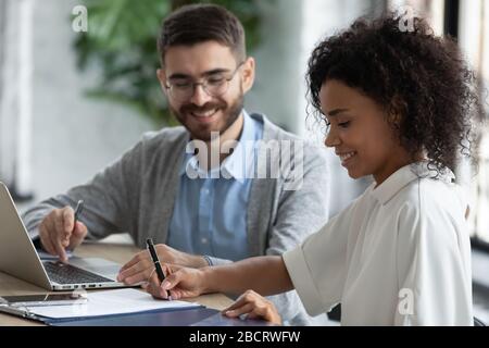 Close up african american businesswoman signing partnership agreement concept.