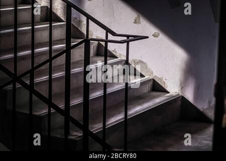 Emergency Fire Concrete Staircase. Concrete Stairs with Sunlight. Exit Escape concept idea Stock Photo