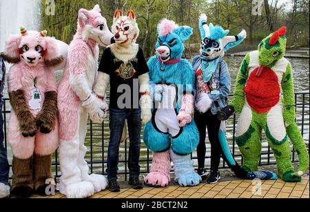 Moscow, Russia. 1st of September, 2020 Young girl wearing furry mask takes  part of annual meeting of fans of the hippie subculture in Tsaritsyno Park  of Moscow, Russia. Several dozen of people