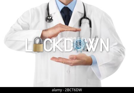 doctor hands with lockdown text padlock and blue corona virus symbol icon isolated on white background Stock Photo