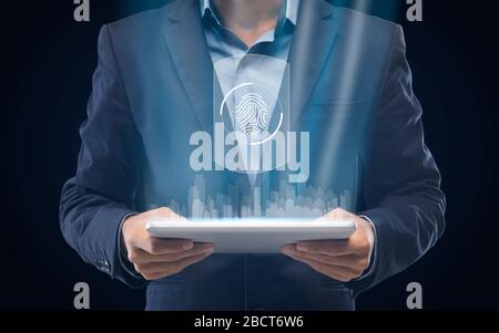 Unrecognizable Businessman Holding Tablet With Holographic City And Fingerprint Scanner Stock Photo