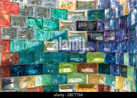A curved wall of coloured glass blocks created by Pae White named Qwalala on the island of San Giorgio Maggiore ,Venice ,Italy Stock Photo
