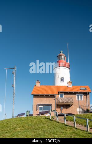 Urk Flevoland Netherlands , a sunny spring day at the old village of Urk with fishing boats at the harbor Stock Photo