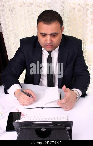 Businessman working at home office. Online meeting from home isolation during quarantine. Stock Photo