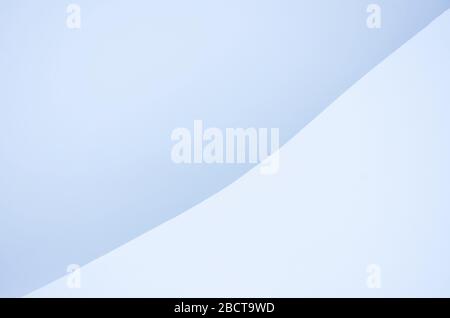 Background photo of man walking through snowy mountains in Norway Stock Photo