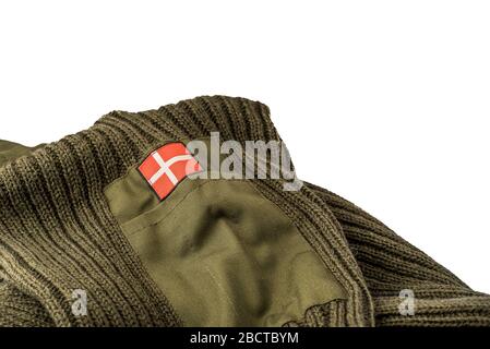 green army sweather with a danish flag isolated on white, Denmark, April 1, 2020