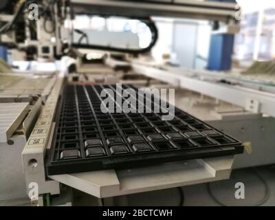 Mechanisms inside pick and place machine for electronics printed circuit board assembling Stock Photo