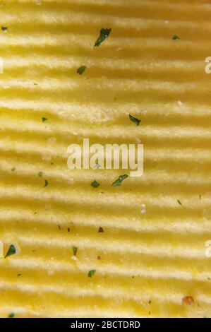 Wavy potato chips abstract texture pattern macro close up Stock Photo
