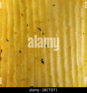 Wavy potato chips abstract texture pattern macro close up Stock Photo