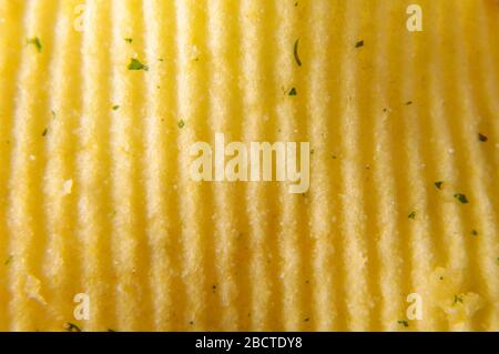 Wavy potato chips abstract texture pattern macro close up Stock Photo