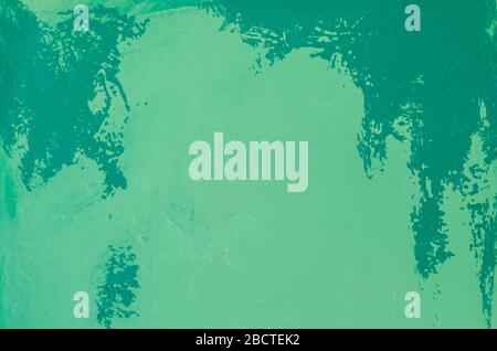 light green background with dark green scratched and ground paint. vintage texture. abstract colorful wall texture Stock Photo