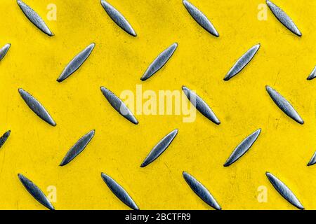 metallic yellow corrugated scratched aged background Stock Photo