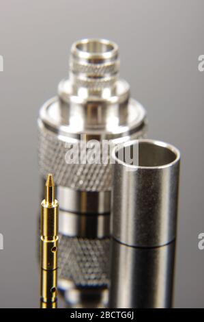 N type coaxial cable connector for high frequency applications assembly parts Stock Photo
