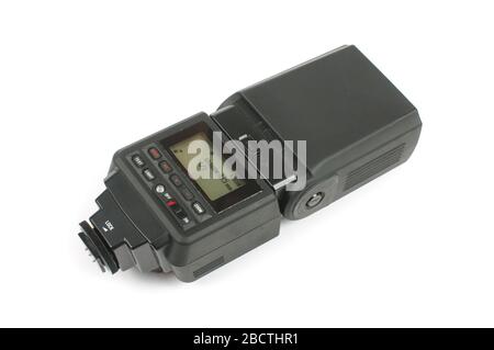 External DSLR photo camera flash called speedlight on the white background Stock Photo