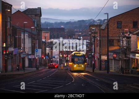 Manchester Metrolink Bombarder Flexity Swift M5000 tram climbing Drake street, Rochdale at dusk Stock Photo