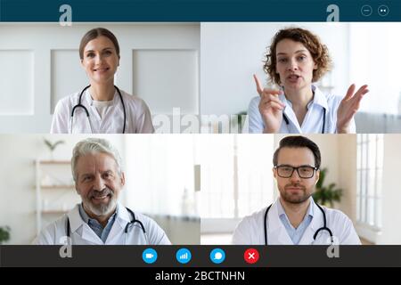 Doctors engaged in distant communication by videocall computer screen view Stock Photo