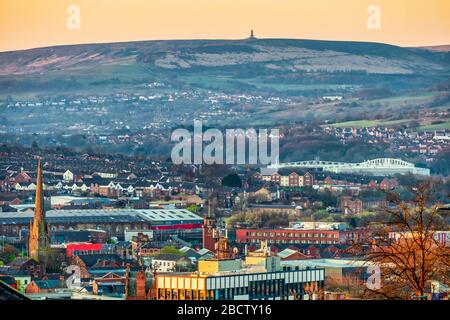 Blackburn Town with Darwen Moors in the distance Stock Photo