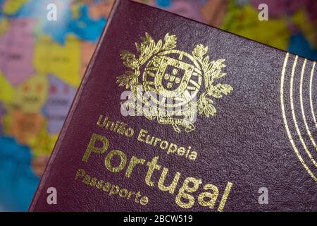 Portuguese international European Union foreign passport. On the background of the earth. Customs concept. Stock Photo