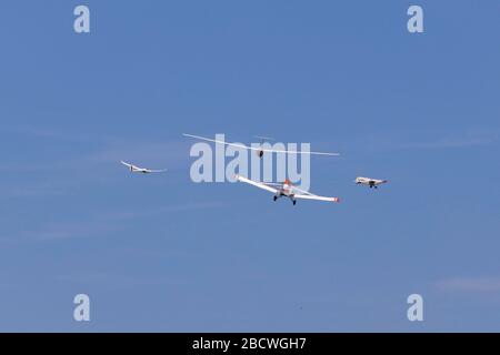 Gliders Launching behind tow aircraft Stock Photo
