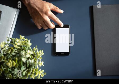 Close up of male using modern smartphone touchscreen Stock Photo