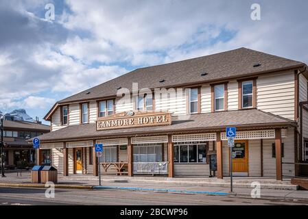 Canmore, Alberta - April 4, 2020: View of the Historic Canmore Hotel in the mountain town of Canmore Alberta. Canmore is a popular tourist destination Stock Photo