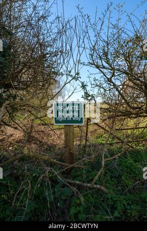 Private, no right of way sign at the edge of a farmers field in Warwickshire, UK Stock Photo