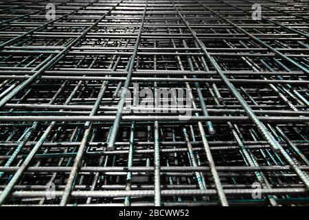 Steel bar for building materials. Wire reinforcing mesh. Industrial grunge background Stock Photo