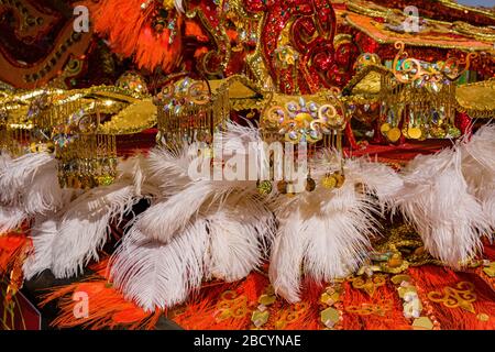 Colorful details of the lady-in-waiting's costumes during the Big Carnival Parade Stock Photo